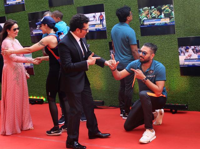 Yuvraj Singh and Sachin Tendulkar pose at the screening of “Sachin: A Billion Dreams”. (Prodip Guha)