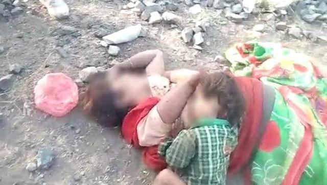 The body of Phullo Ahirwar was found lying beside railway tracks in Damoh on Wednesday with her toddler-son Devi Singh sucking his mother’s breasts. (HT PHOTO)