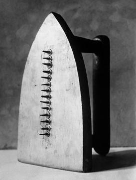 This image is called The Gift and was shot by Man Ray in 1921. (© Man Ray Trust – ADAGP / Courtesy MONDO GALERIA | TARQ)
