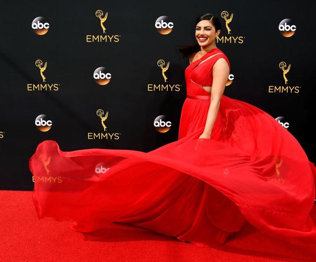 Priyanka Chopra flaunts her gown at the Emmys.