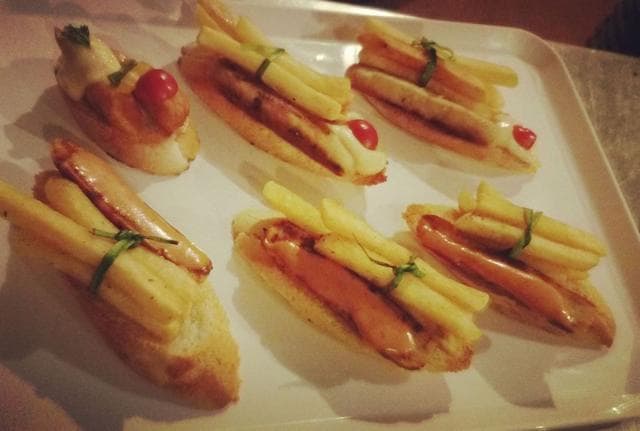 A version of the Spanish pincho, strips of meat and potato tied to garlic bread and topped with cherry tomatoes. (Facebook/ Chez Jerome - Q Café) A version of the Spanish pincho, strips of meat and potato tied to garlic bread and topped with cherry tomatoes. (Facebook/ Chez Jerome - Q Café)