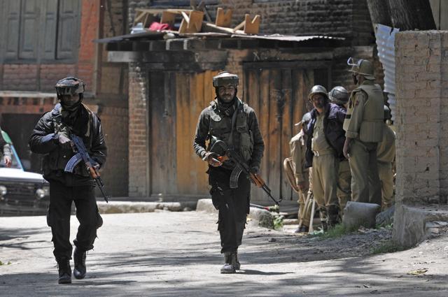 Army soldiers patrol following a gun battle at Saimoh village, in Tral area. (Waseem Andrabi/ HT Photo) Army soldiers patrol following a gun battle at Saimoh village, in Tral area. (Waseem Andrabi/ HT Photo)