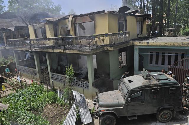 The damaged house, where militants had taken refuge during a gunbattle at Saimoh village, in Tral area, about 45 Kilometres south of Srinagar on May 27. (Waseem Andrabi / Hindustan Times) The damaged house, where militants had taken refuge during a gunbattle at Saimoh village, in Tral area, about 45 Kilometres south of Srinagar on May 27. (Waseem Andrabi / Hindustan Times)