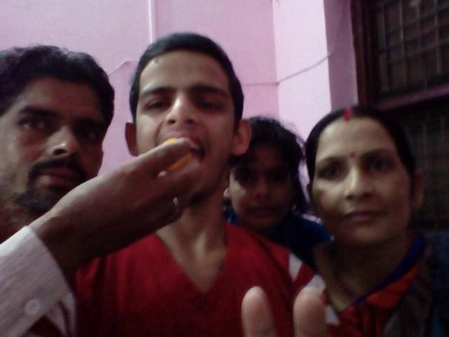 Ashok Yadav with his parents. (Handout) Ashok Yadav with his parents. (Handout)