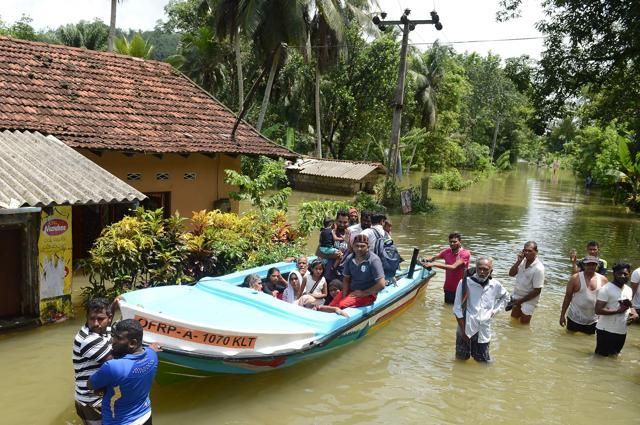 Rainfall on May 26 triggered the worst flooding and landslides in 14 years in the southern and western parts of the island. (AFP Photo) Rainfall on May 26 triggered the worst flooding and landslides in 14 years in the southern and western parts of the island. (AFP Photo)