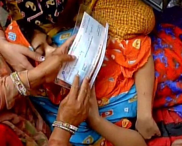 Union minister Venkaiah Naidu gives a cheque of Rs 50,000 to the family of e-rickshaw driver, who was beaten to death in Delhi. (ANI) Union minister Venkaiah Naidu gives a cheque of Rs 50,000 to the family of e-rickshaw driver, who was beaten to death in Delhi. (ANI)