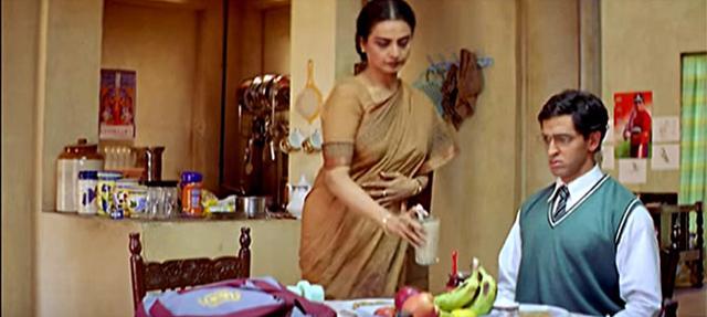Rekha feeds son Hrithik Roshan in the film Koi... Mil Gaya (2003). Rekha feeds son Hrithik Roshan in the film Koi... Mil Gaya (2003).