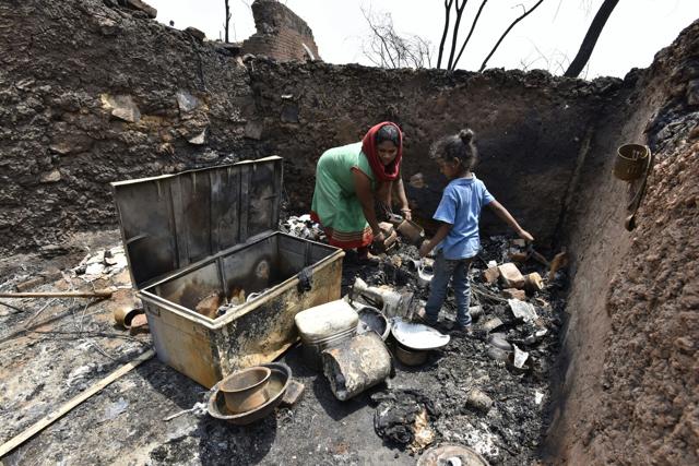 Around 105 huts were gutted in the fire. (Sanjeev Verma/HT Photo)