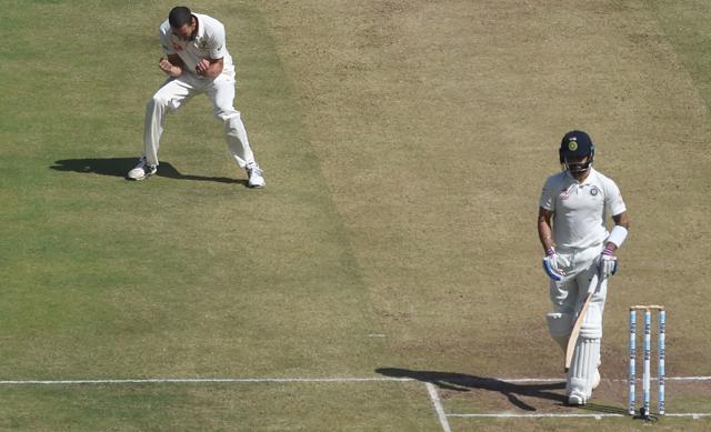 Australia's Mitchell Starc (L) celebrates after the dismissal of India's captain Virat Kohli during the second day of the first cricket Test match between India and Australia in Pune on February 24, 2017 (AFP) Australia's Mitchell Starc (L) celebrates after the dismissal of India's captain Virat Kohli during the second day of the first cricket Test match between India and Australia in Pune on February 24, 2017 (AFP)
