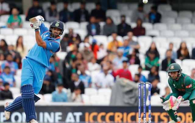 Shikhar Dhawan and Dinesh Karthik shared a partnership of over 100 runs in the game against Bangladesh at The Oval. (AFP) Shikhar Dhawan and Dinesh Karthik shared a partnership of over 100 runs in the game against Bangladesh at The Oval. (AFP)