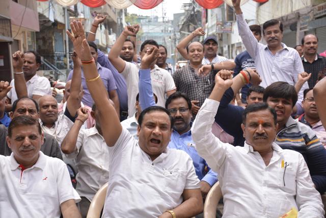 Ghaziabad Chemists & Druggists Association members staged a sit-in protest at their business establishments at Nai Basti wholesale market in Ghaziabad on Tuesday. (Sakib Ali /HT Photo) Ghaziabad Chemists & Druggists Association members staged a sit-in protest at their business establishments at Nai Basti wholesale market in Ghaziabad on Tuesday. (Sakib Ali /HT Photo)