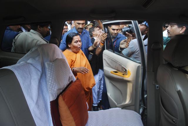 Water resources minister Uma Bharti leaves after appearing before the CBI court in Lucknow on Tuesday. (AP) Water resources minister Uma Bharti leaves after appearing before the CBI court in Lucknow on Tuesday. (AP)