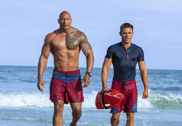This image released by Paramount Pictures shows Dwayne Johnson as Mitch Buchannon, left, and Zac Efron as Matt Brody in Baywatch. (AP)