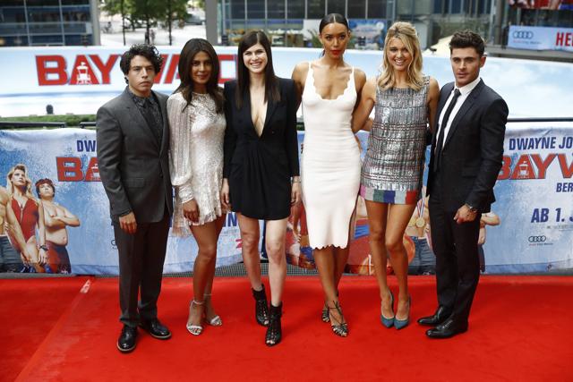 Jon Bass, Priyanka Chopra, Alexandra Daddario, Kelly Rohrbach (L) and Ilfenesh Hadera and Zac Efron pose for photographers during a photocall to promote the Europe premiere of Baywatch. (AFP) Jon Bass, Priyanka Chopra, Alexandra Daddario, Kelly Rohrbach (L) and Ilfenesh Hadera and Zac Efron pose for photographers during a photocall to promote the Europe premiere of Baywatch. (AFP)