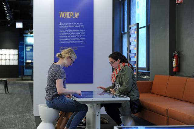 Visitors play a word game at the Museum. (AFP) Visitors play a word game at the Museum. (AFP)
