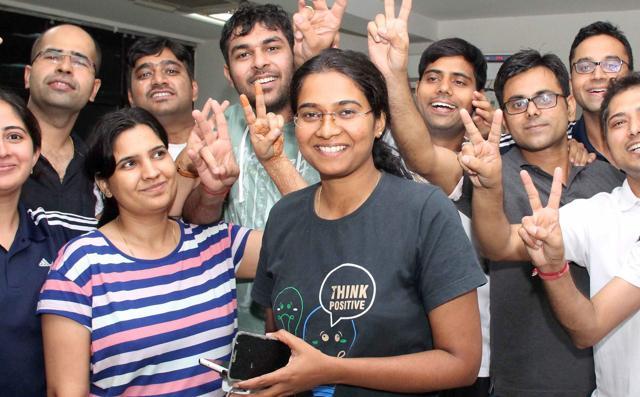 Nandini K R (c) who got the first rank in the Civil Services Exams 2016 celebrate with her colleague in Faridabad on Wednesday, May 31, 2016. (PTI) Nandini K R (c) who got the first rank in the Civil Services Exams 2016 celebrate with her colleague in Faridabad on Wednesday, May 31, 2016. (PTI)