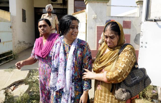 The shaken mother and sister of Rajatvir outside their house. (Bharat Bhushan/HT) The shaken mother and sister of Rajatvir outside their house. (Bharat Bhushan/HT)