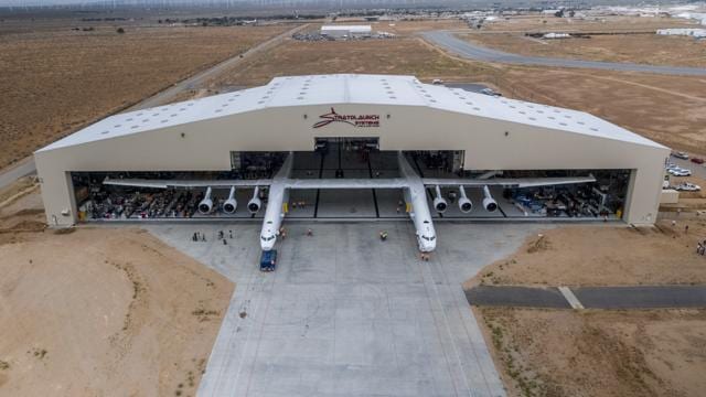 The Stratolaunch plane is pushed out of the hanger for the first time in the Mojave desert, California on May 31, 2017. Touted as the world’s largest aircraft built yet, the plane is apparently on track for its first launch demonstration as early at 2019. (AFP) The Stratolaunch plane is pushed out of the hanger for the first time in the Mojave desert, California on May 31, 2017. Touted as the world’s largest aircraft built yet, the plane is apparently on track for its first launch demonstration as early at 2019. (AFP)