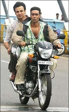 Actors Ajay Devgn and Vivek Oberoi in Yuva.