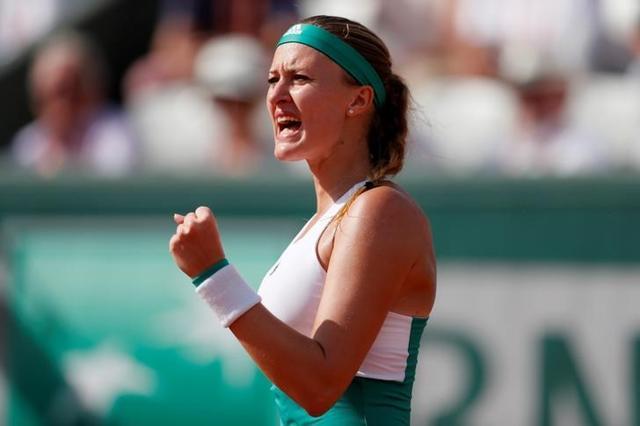 France's Kristina Mladenovic reacts during her second round match against Italy's Sara Errani. (REUTERS)