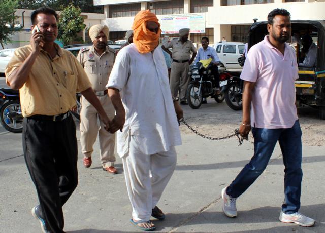 Rajatvir’s father Harpreet Singh in police custody at the districts court in Patiala on Friday, June 2. (Bharat Bhushan/HT) Rajatvir’s father Harpreet Singh in police custody at the districts court in Patiala on Friday, June 2. (Bharat Bhushan/HT)