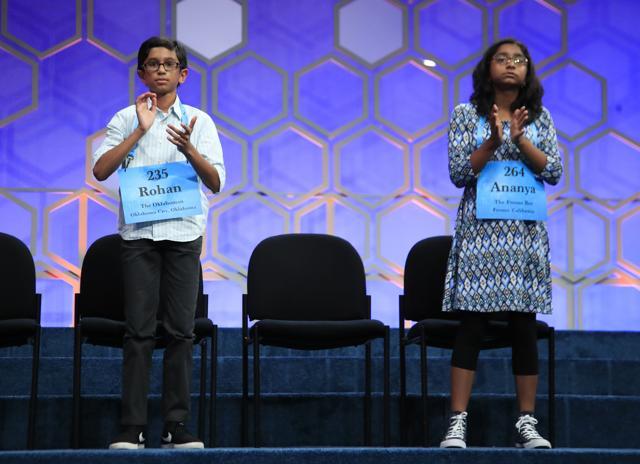 The final two spellers Rohan Rajeev, 14, from Edmond, Okla., and Ananya Vinay, 12, from Fresno, California, right, applaud during the finals of the 90th Scripps National Spelling Bee. (AP Photo) The final two spellers Rohan Rajeev, 14, from Edmond, Okla., and Ananya Vinay, 12, from Fresno, California, right, applaud during the finals of the 90th Scripps National Spelling Bee. (AP Photo)