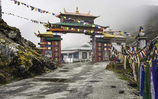The Buddhist architectural and colorful gateway into Tawang on highway 229 on a misty morning and Himalayas in the background. (Shutterstock) The Buddhist architectural and colorful gateway into Tawang on highway 229 on a misty morning and Himalayas in the background. (Shutterstock)
