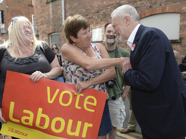 Jeremy Corbyn meets supporters on Saturday. (AP) Jeremy Corbyn meets supporters on Saturday. (AP)