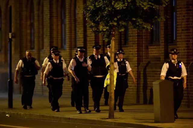 Police attend to an incident near London Bridge in London, Britain, June 4. (REUTERS) Police attend to an incident near London Bridge in London, Britain, June 4. (REUTERS)