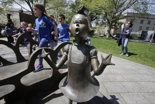 Children play near a bronze statue of a Dr. Seuss character at the The Dr. Seuss National Memorial Sculpture Garden, in Springfield. (AP) Children play near a bronze statue of a Dr. Seuss character at the The Dr. Seuss National Memorial Sculpture Garden, in Springfield. (AP)