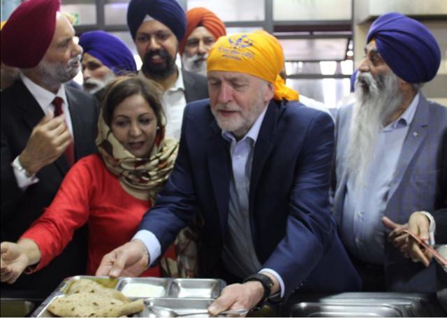 Labour Party leader Jeremy Corbyn eating at the ‘langar’ or community kitchen of the Gurdwara Sri Guru Singh Sabha. (Twitter)
