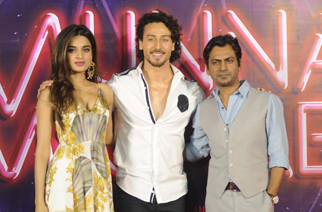 Nidhhi Aggrwal (L), Tiger Shroff (C) and Nawazuddin Siddiqui strike a pose. (AFP) Nidhhi Aggrwal (L), Tiger Shroff (C) and Nawazuddin Siddiqui strike a pose. (AFP)