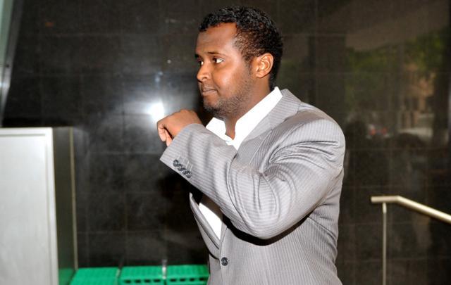 Yacqub Khayre walks from a court appearance in Melbourne, Australia in this December 23, 2010 picture. Police on June 5, 2017, shot dead Yacqub Khayre after he held a woman hostage inside an apartment building in Melbourne. (REUTERS) Yacqub Khayre walks from a court appearance in Melbourne, Australia in this December 23, 2010 picture. Police on June 5, 2017, shot dead Yacqub Khayre after he held a woman hostage inside an apartment building in Melbourne. (REUTERS)