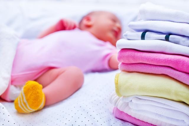 Dress your baby in cotton clothes to help the skin breathe. (Shutterstock) Dress your baby in cotton clothes to help the skin breathe. (Shutterstock)