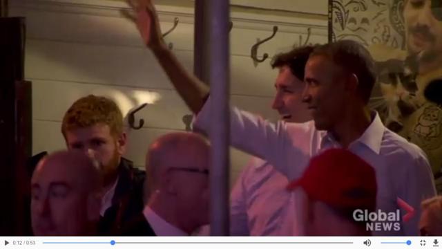 The duo being greeted by a crowd outside the Liverpool House, Montreal. (Screengrab)