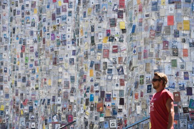 A volunteer walks past columns of books forming "The Parthenon of Books". (AFP/John Macdougall) A volunteer walks past columns of books forming "The Parthenon of Books". (AFP/John Macdougall)