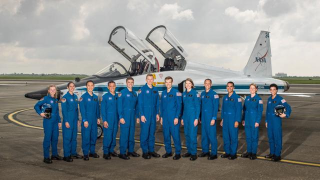 NASA’s 12 new astronauts pose for a gropu photo at the Johnson Space Center in Houston. (AP)