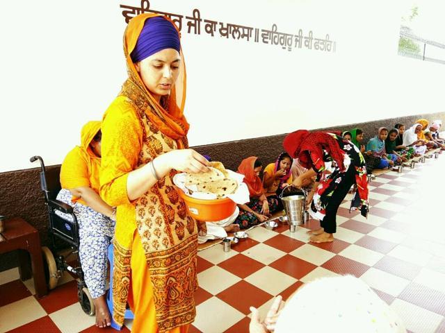 Relatives of Preet Kaur Gill organised langar in a gurdwara after her victory in Jamsher village of the district. (HT Photo) Relatives of Preet Kaur Gill organised langar in a gurdwara after her victory in Jamsher village of the district. (HT Photo)