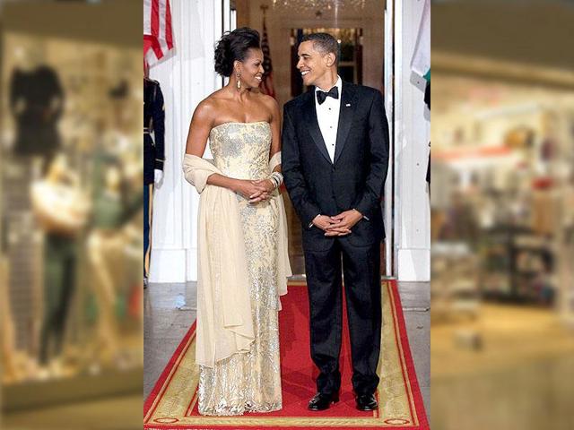 She accompanies the US President to greet former PM Manmohan Singh at the White House, wearing a silver-appliqué Naeem Khan gown.
