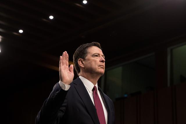 Former FBI Director James Comey sworn in before the Senate Intelligence Committee in the Hart Senate Office Building on Capitol Hill June 8, 2017 in Washington, DC. (AFP) Former FBI Director James Comey sworn in before the Senate Intelligence Committee in the Hart Senate Office Building on Capitol Hill June 8, 2017 in Washington, DC. (AFP)