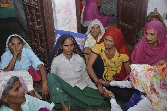 The families of the two men gunned down in Bamheta village, Ghaziabad, on Thursday night. (Sakib Ali/HT) The families of the two men gunned down in Bamheta village, Ghaziabad, on Thursday night. (Sakib Ali/HT)