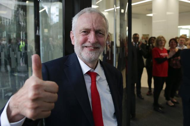 Britain's opposition Labour Party Leader Jeremy Corbyn gives a thumbs up as he arrives at the party headquarters in central London on June 9, 2017 after results in a snap general election showed a hung parliament with Labour gains and the Conservatives losing their majority. (AFP) Britain's opposition Labour Party Leader Jeremy Corbyn gives a thumbs up as he arrives at the party headquarters in central London on June 9, 2017 after results in a snap general election showed a hung parliament with Labour gains and the Conservatives losing their majority. (AFP)