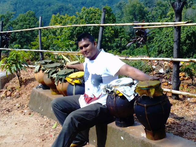 A member of the organising team poses with jars of bitchi before the start of the beef festival. (HT Photo)
