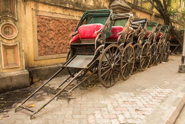 Traditional hand pulled Indian rickshaws parked together. (Shutterstock) Traditional hand pulled Indian rickshaws parked together. (Shutterstock)
