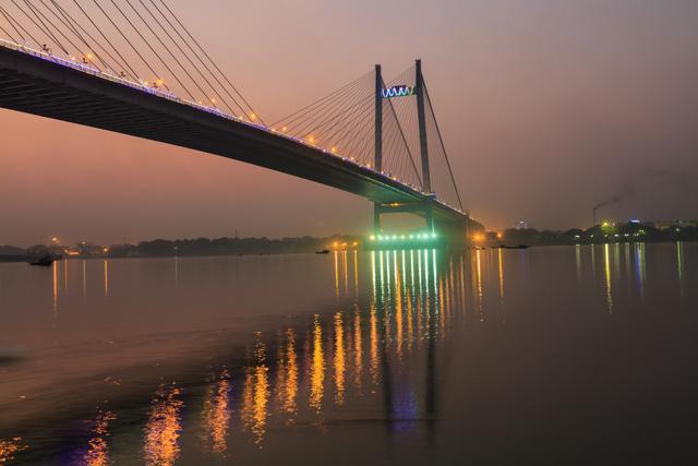 Vidyasagar Setu (bridge) built on the river Hooghly is the longest cable stayed bridge in India. Photograph shot from Princep Ghat, Kolkata at dusk. (Shutterstock) Vidyasagar Setu (bridge) built on the river Hooghly is the longest cable stayed bridge in India. Photograph shot from Princep Ghat, Kolkata at dusk. (Shutterstock)