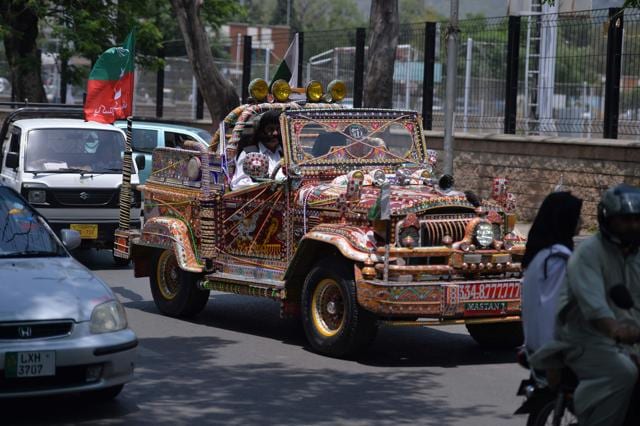 Seventy-year-old Mastan Khan Wazir drives his blinged-out jeep in Islamabad. (AFP) Seventy-year-old Mastan Khan Wazir drives his blinged-out jeep in Islamabad. (AFP)