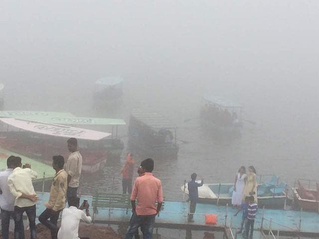Tourists were seen welcoming the rain (HT PHOTO)
