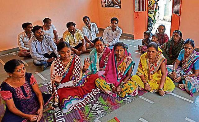 Champa Jadhav (second from left) from Uttane village in Kalyan will lose 2 acres of her paddy and vegetable fields to the project. (Vijayanand Gupta/HT )