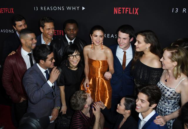 This file photo taken on March 30, 2017 shows actress/singer Selena Gomez (C) surrounded by cast members as they arrive for the premiere Of Netflix's 13 Reasons Why at Paramount Pictures Studio in Los Angeles. (AFP) This file photo taken on March 30, 2017 shows actress/singer Selena Gomez (C) surrounded by cast members as they arrive for the premiere Of Netflix's 13 Reasons Why at Paramount Pictures Studio in Los Angeles. (AFP)