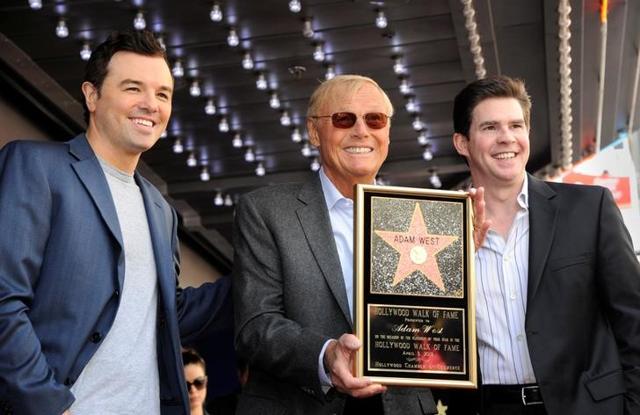 Actor Adam West (C) poses with actor and producer Seth MacFarlane (L) and radio personality Ralph Garman after receiving a star on the Hollywood Walk of Fame in Los Angeles April 5, 2012. Actor Adam West (C) poses with actor and producer Seth MacFarlane (L) and radio personality Ralph Garman after receiving a star on the Hollywood Walk of Fame in Los Angeles April 5, 2012.